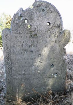 Shot up gravestone